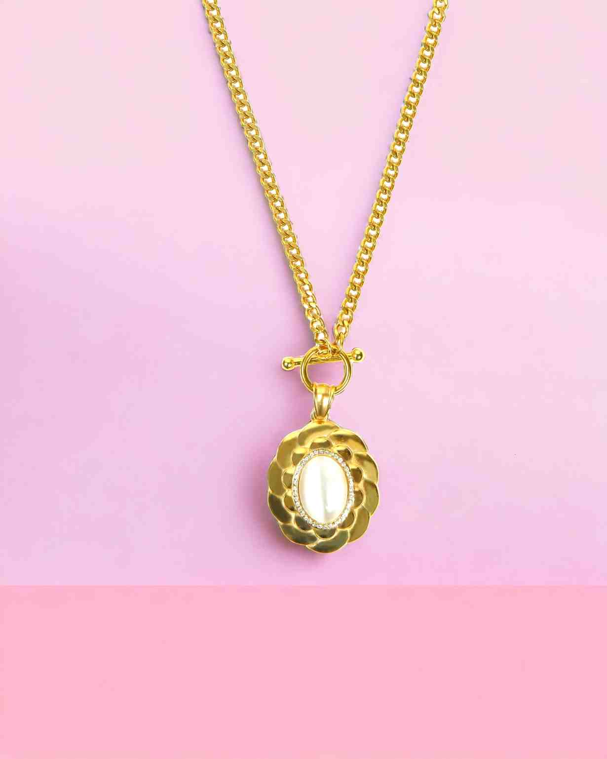 Artistic gold necklace with white onyx glass stone